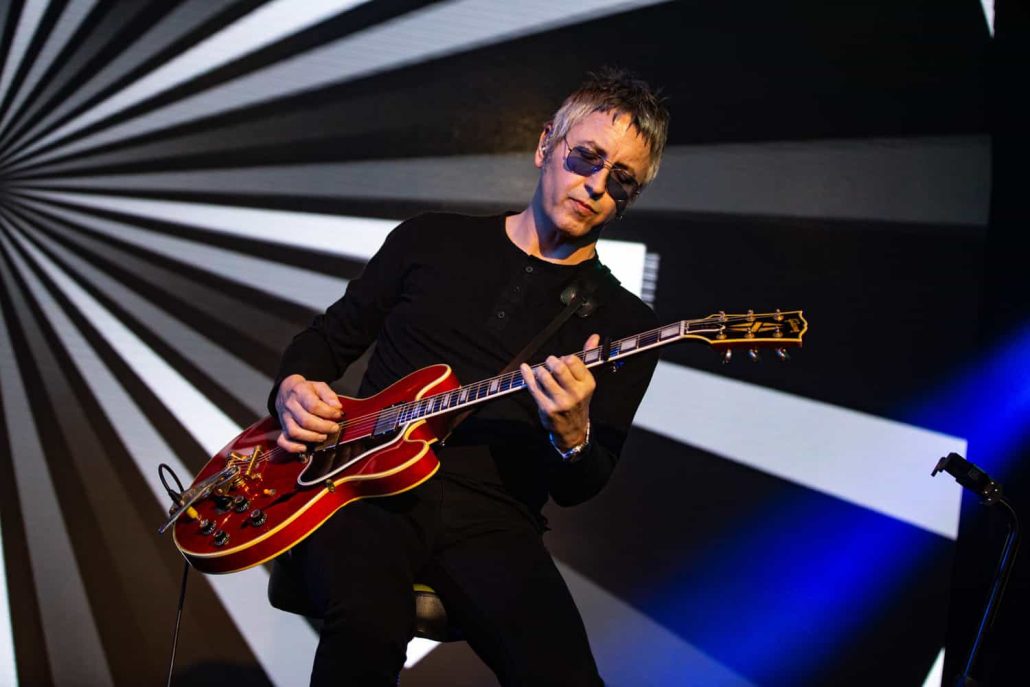noel gallagher on stage at the hilton manchester