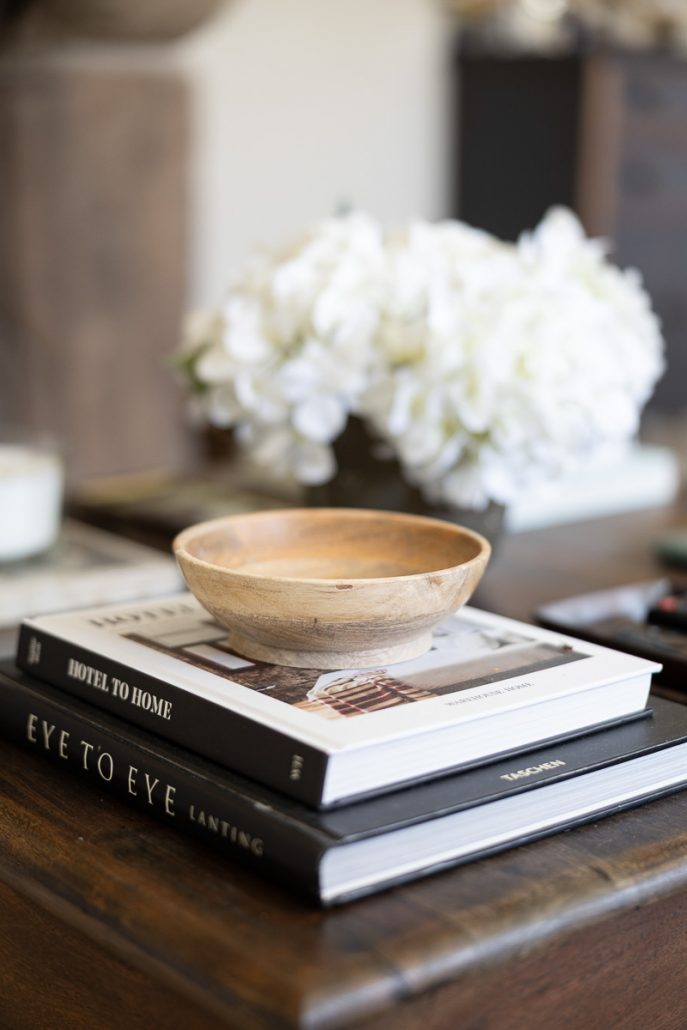 cosy living space with cream sofa, wooden coffee table, and styled décor.
