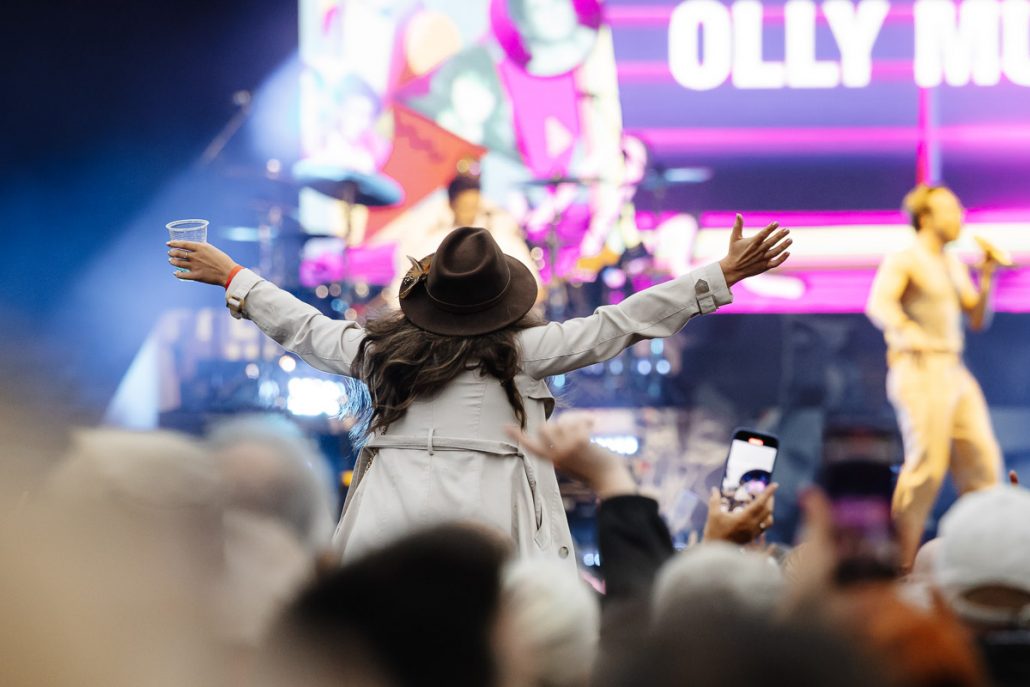 Fans enjoying fairground ride before Olly Murs concert at Cartmel Racecourse