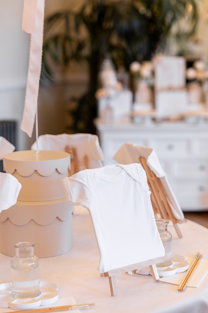 Painting station with baby vests