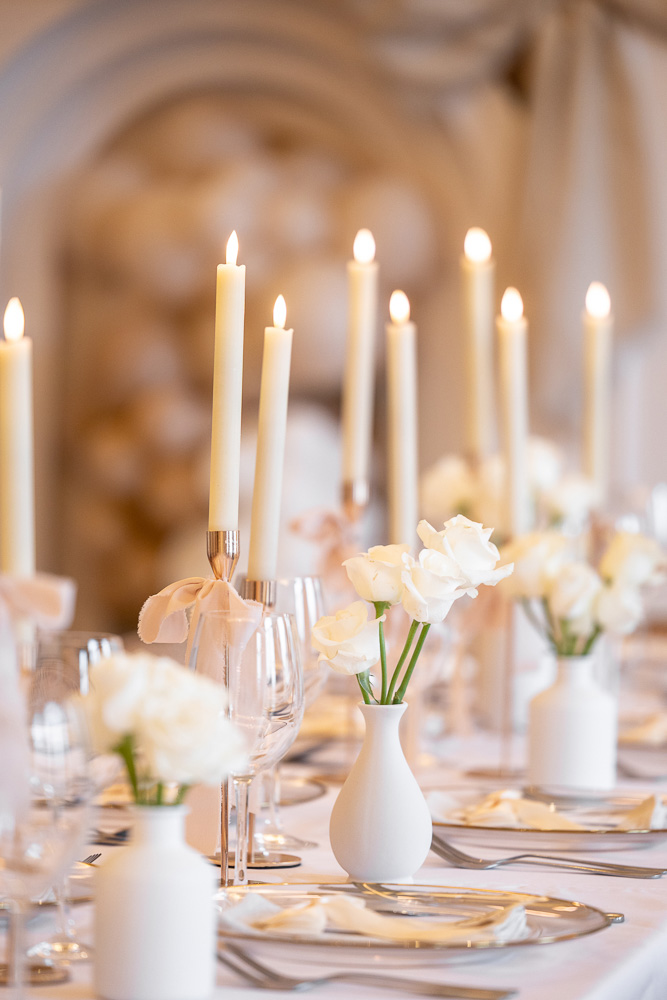 Table setting close up with roses and candles