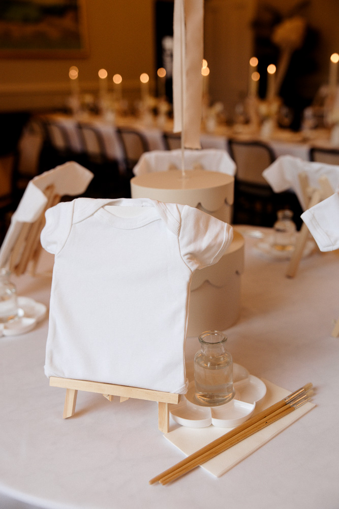 Painting station with baby vests