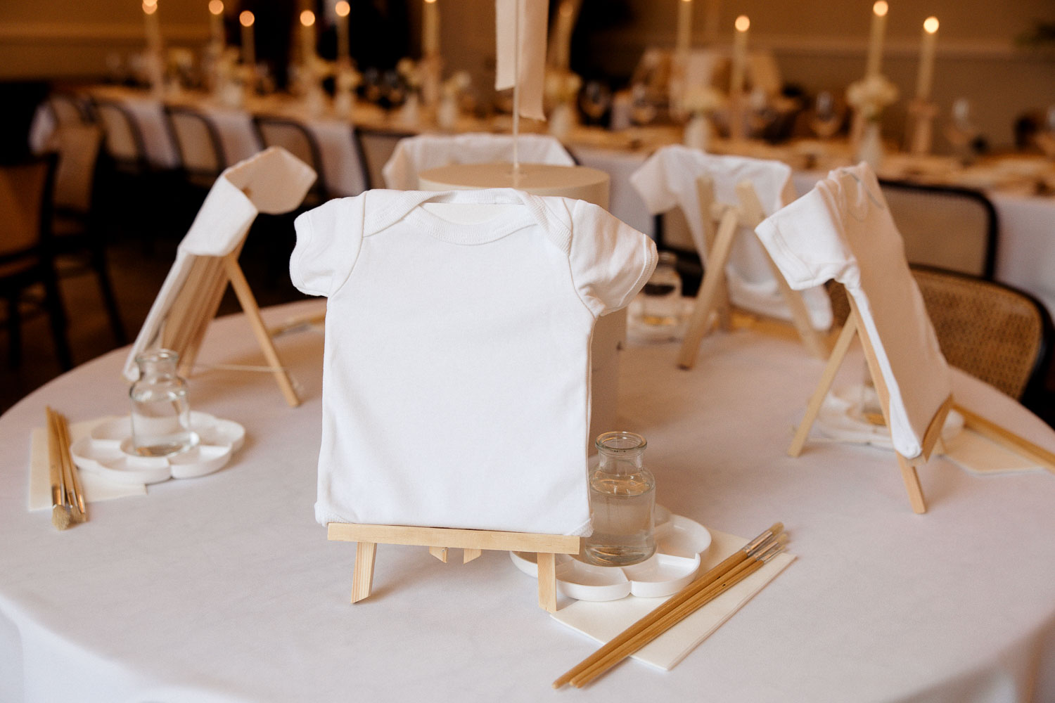 Painting station with baby vests