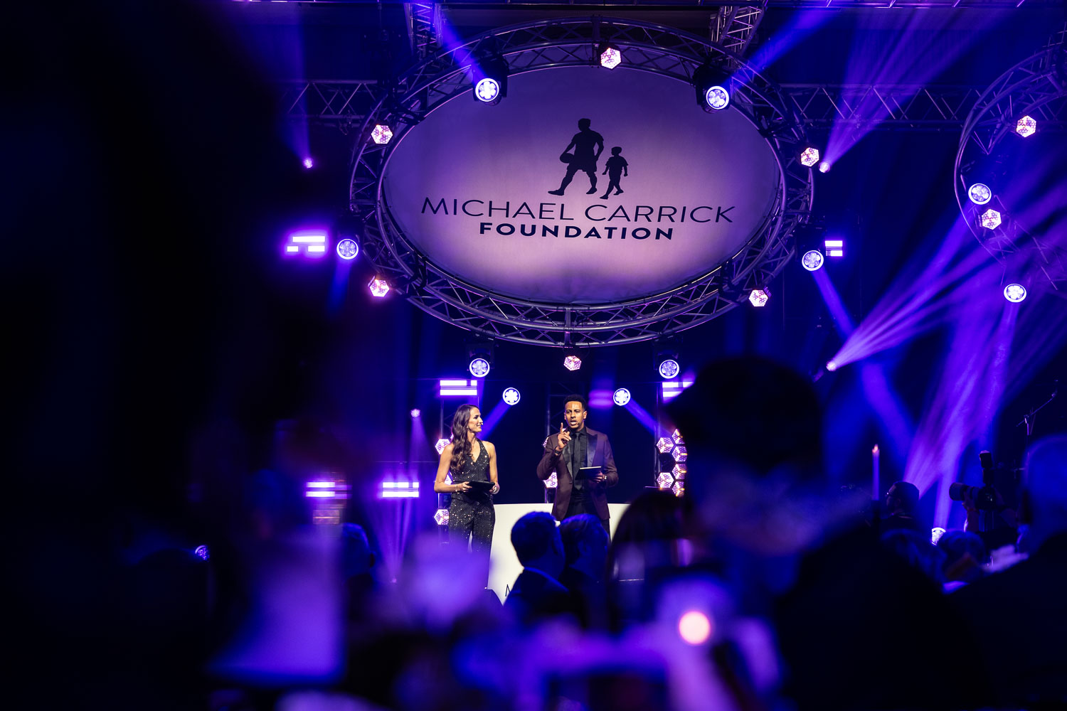 hosts at a charity event at the deansgate hotel manchester