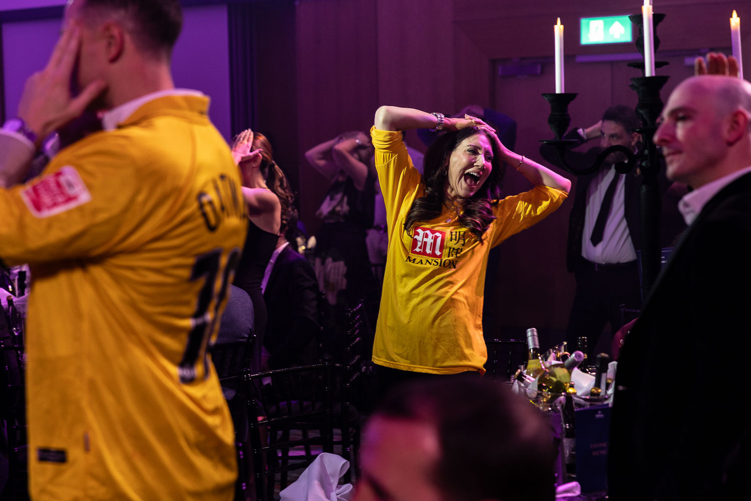 hosts at a charity event at the deansgate hotel manchester