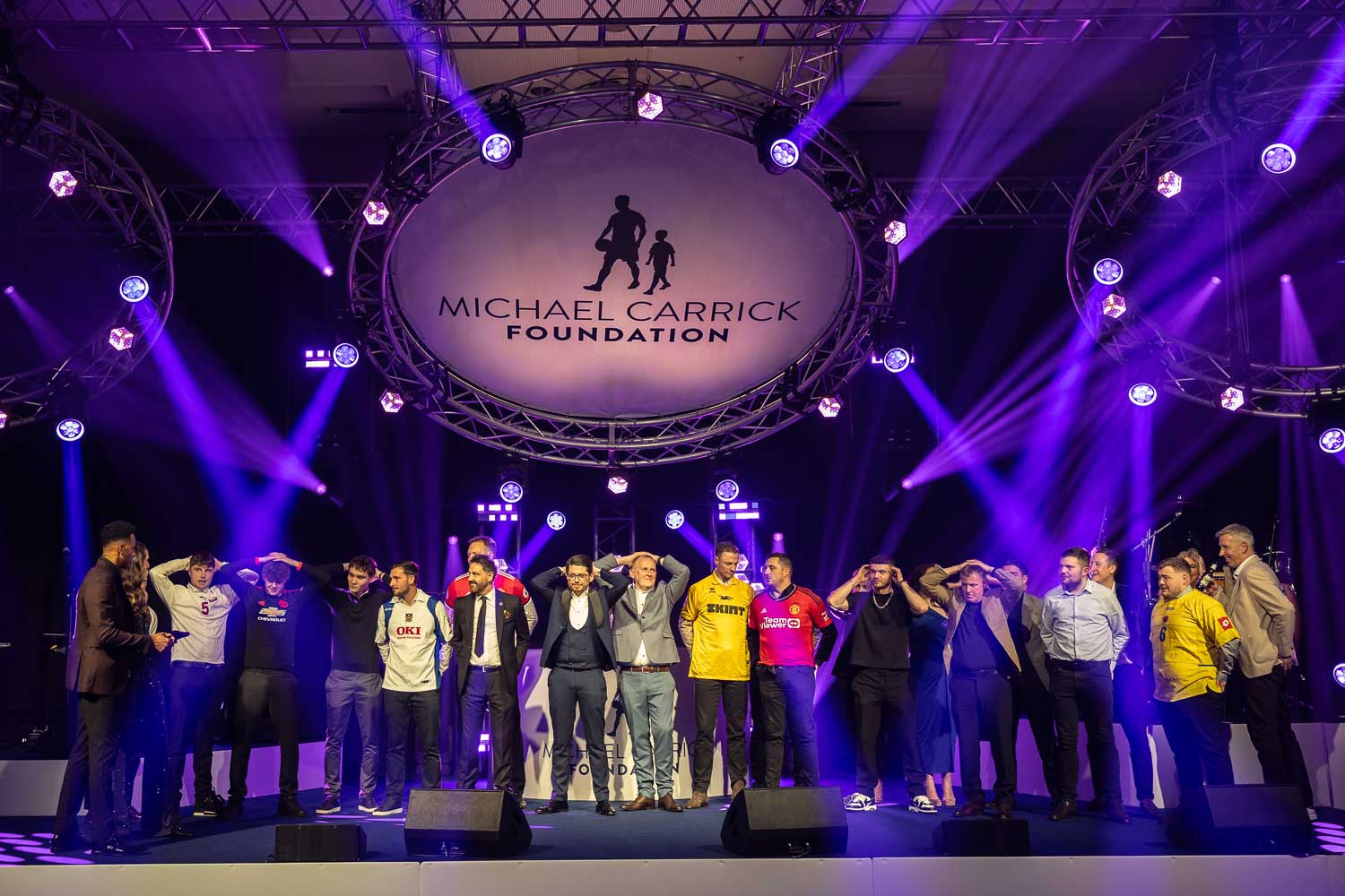 hosts at a charity event at the deansgate hotel manchester