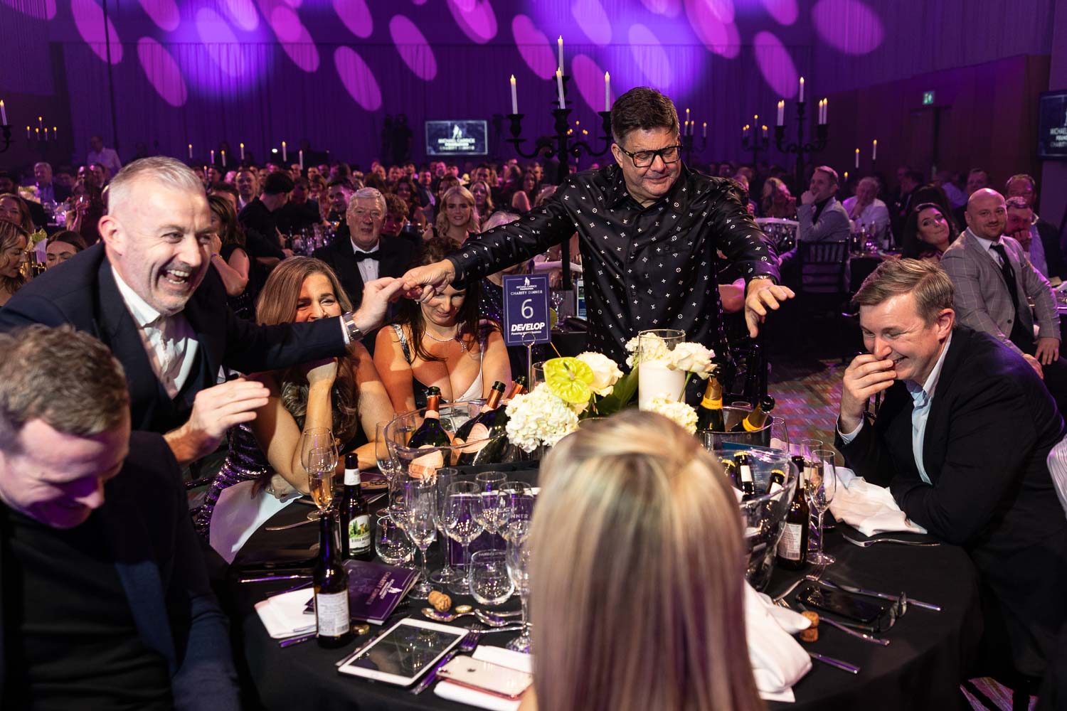 hosts at a charity event at the deansgate hotel manchester