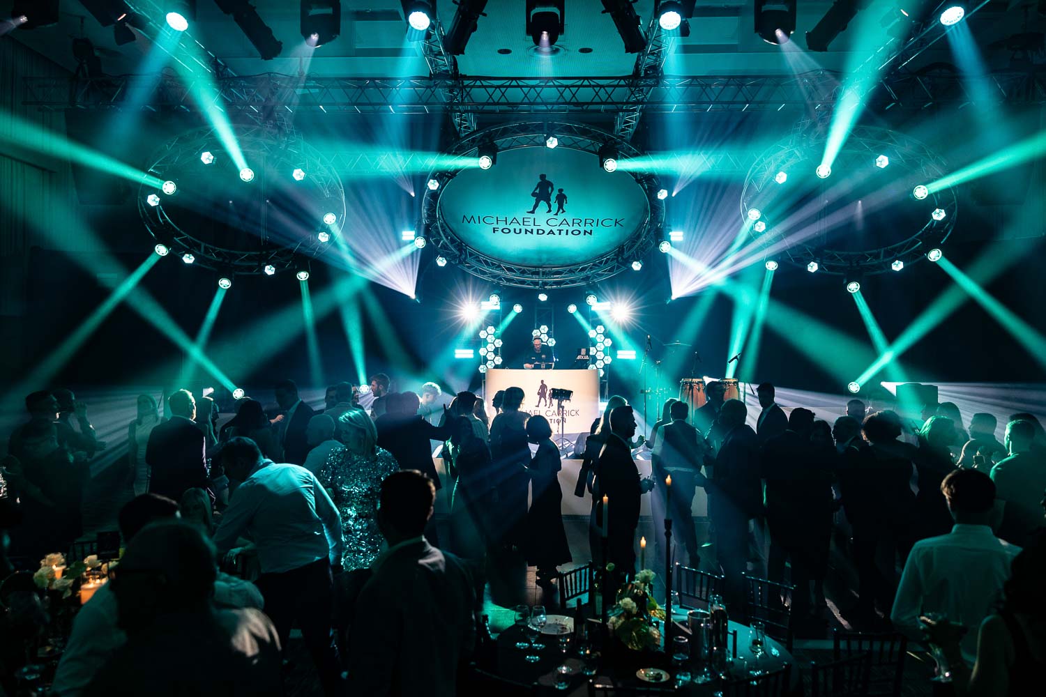 ighlights from the Michael Carrick Foundation Dinner 2025, photographed by Event Photographer Manchester at The Deansgate Manchester Hotel. Live music, auctions and a packed dance floor.