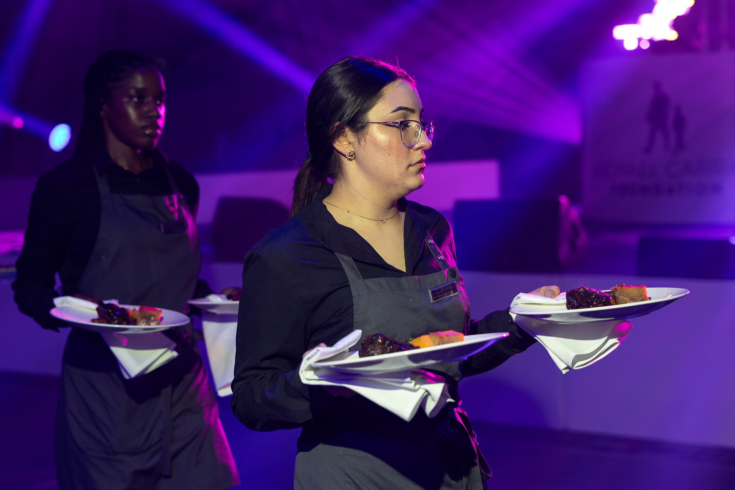 hosts at a charity event at the deansgate hotel manchester