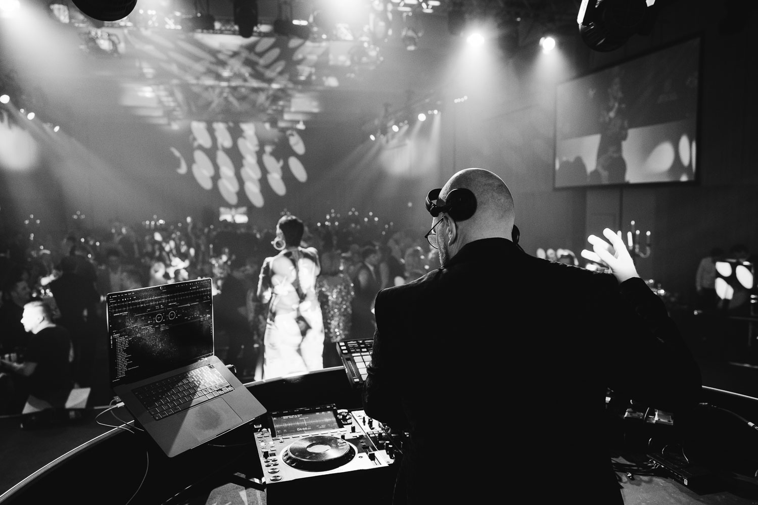 julie mcknight entertaining the guests at a charity dinner