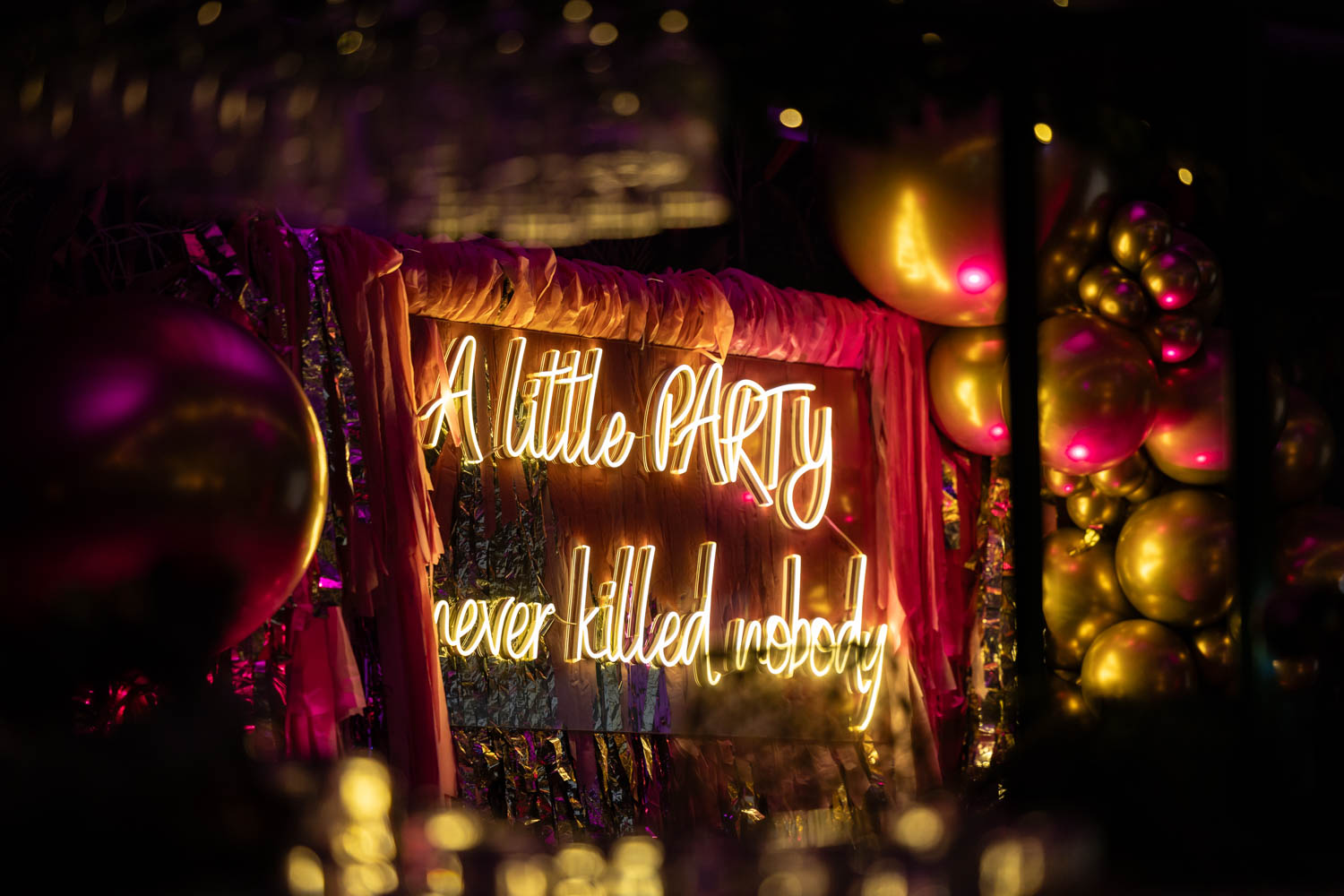 A photograph of a room decorated in gold and pink for an 18th birthday party in Altrincham