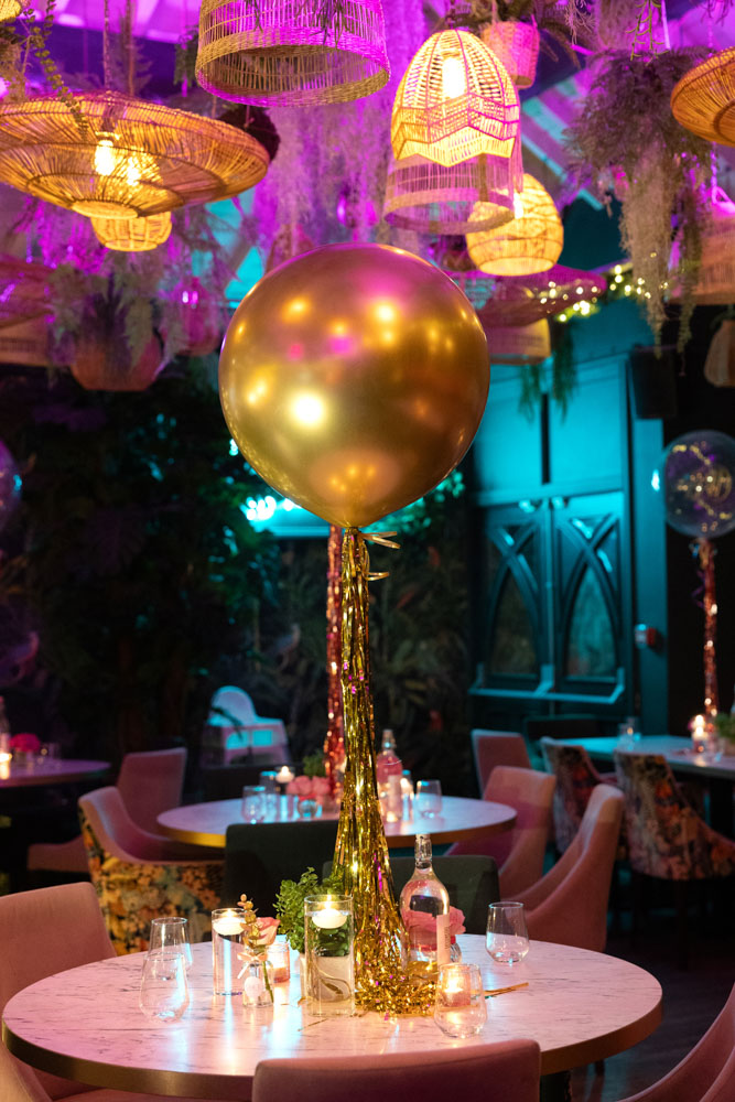 A photograph of a room decorated in gold and pink for an 18th birthday party in Altrincham