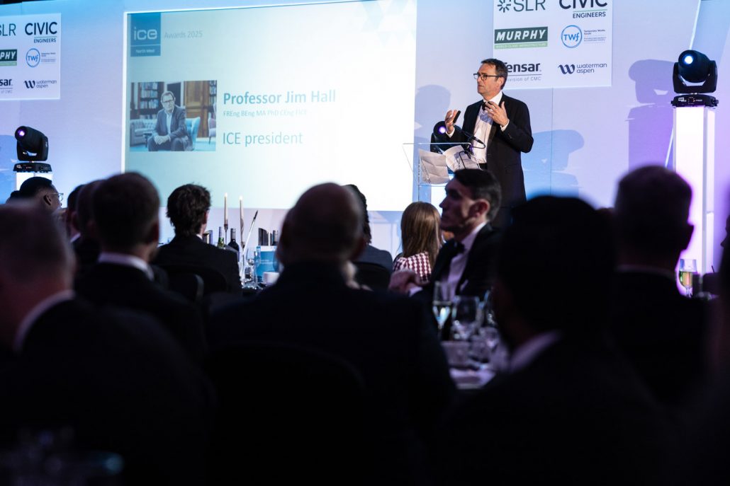 Professor speaking on stage during ICE Awards 2025 ceremony captured by Awards Event Photographers Manchester