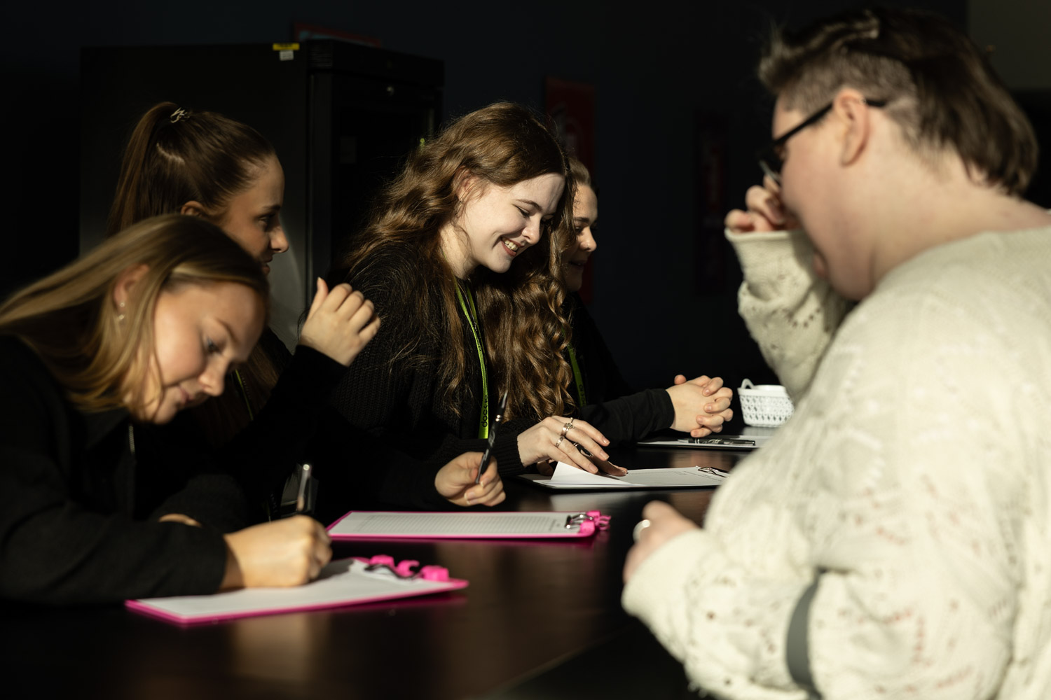 Students registering and networking at the Royal Television Society student event at Dock 10, Conference Photography Manchester.
