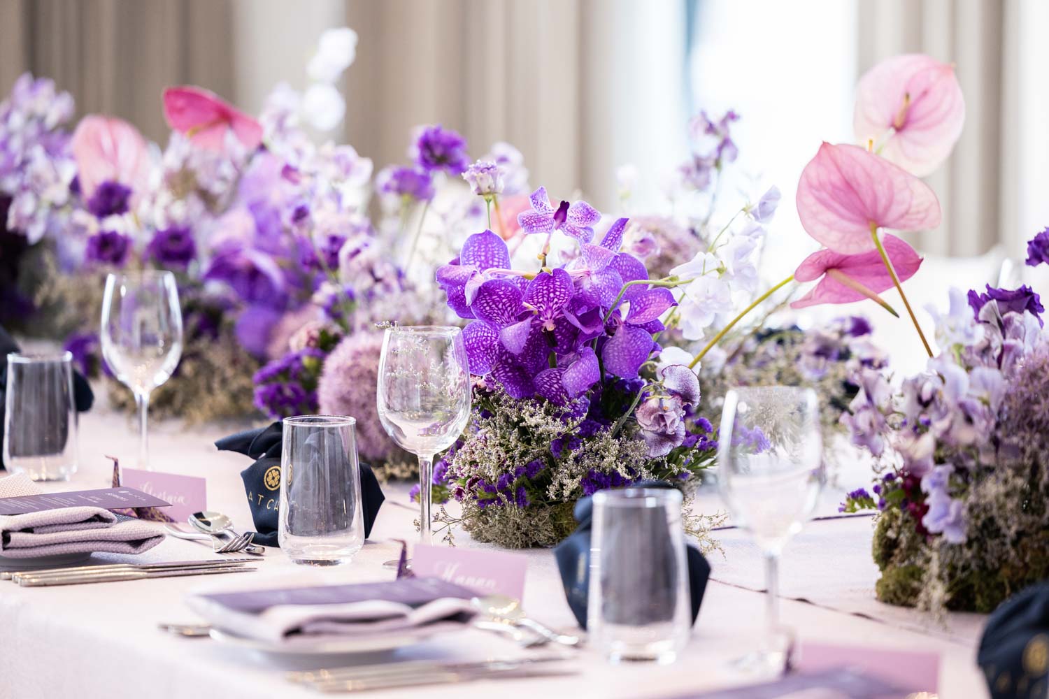 Tatcha Event Table Display with Purple Accents