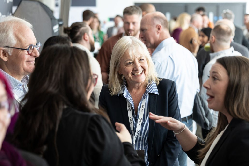 Guests networking during WS Audiology event photographed by conference photographer Manchester