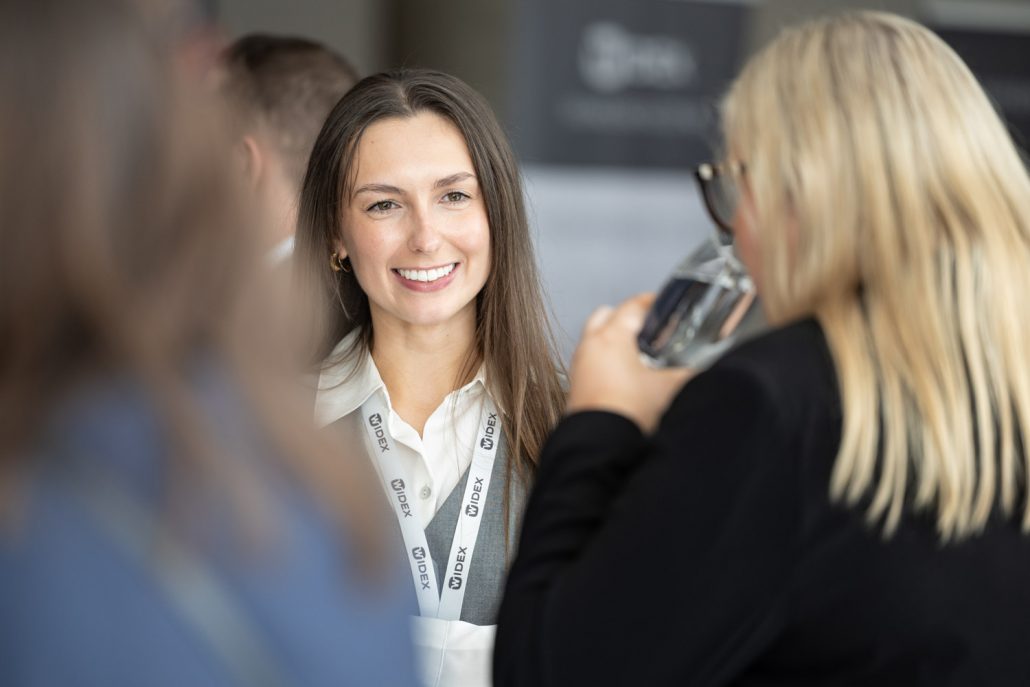 Guests networking during WS Audiology event photographed by conference photographer Manchester