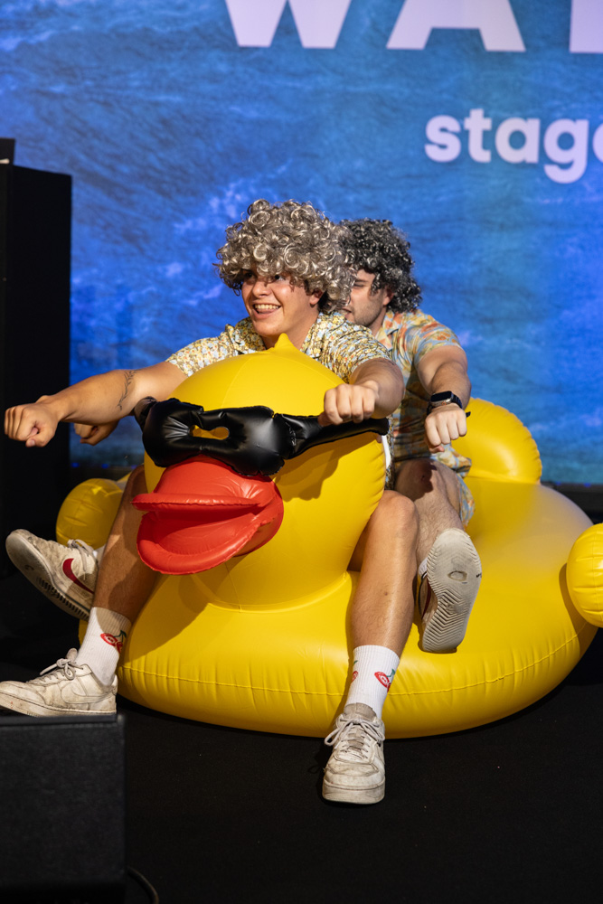 Conference Photographer Manchester capturing fun inflatable duck game at corporate conference event